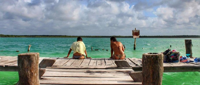 Lagune Kaan Luum Mexique couple sur le ponton